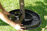Mat is quickly and easily placed around a tree