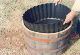 Flex-O-Liner being easily installed into a barrel-style pot. 